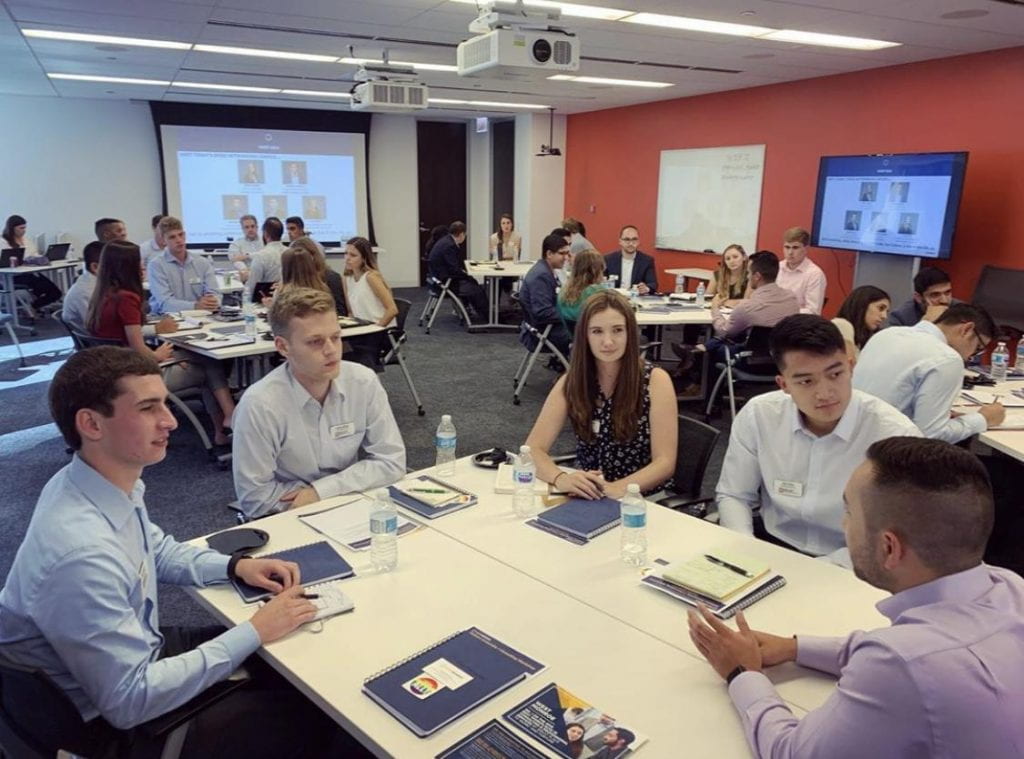 Kelley Consulting Workshop members meeting with CW alum Andrew Koultourides & colleagues at West Monroe Partners on the August 2019 Chicago Trip